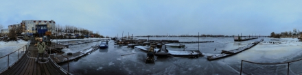 река Кузнечиха, протока Северной Двины, вид на Соломбалу и Архангельск, Зима. Фотография.